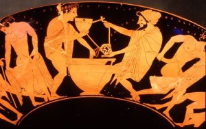Coppa a figure rosse; pittore di Epèleios, raffigurante un personaggio imberbe che si accosta ad un vaso per mischiare il vino con l'acqua recando in mano uno skyphos, e con la mano sini- stra protesa verso la bevanda. ca. 510 a.C.
